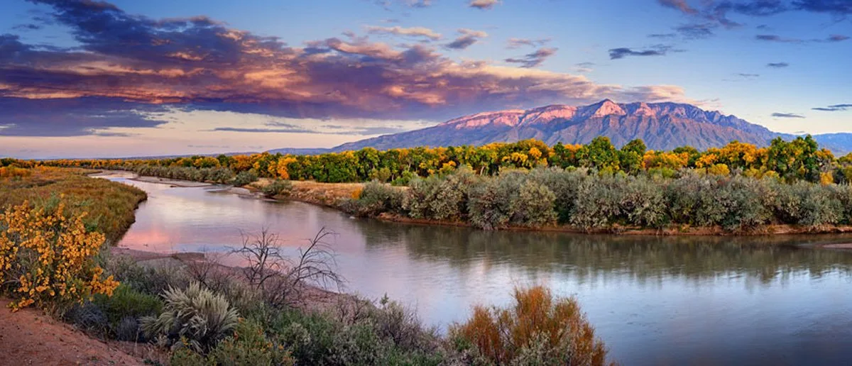 The Rio Grande, with the Sandia Mountains in the background.